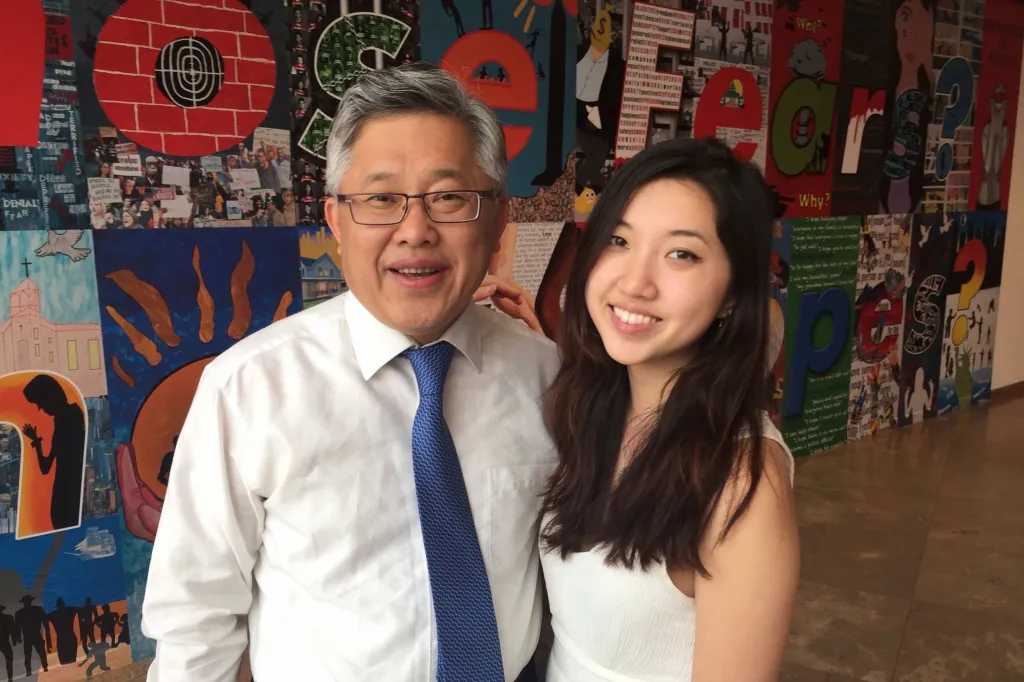 Pastor Ezra Jin Mingri and daughter Grace Jin Drexel pose for a photo.