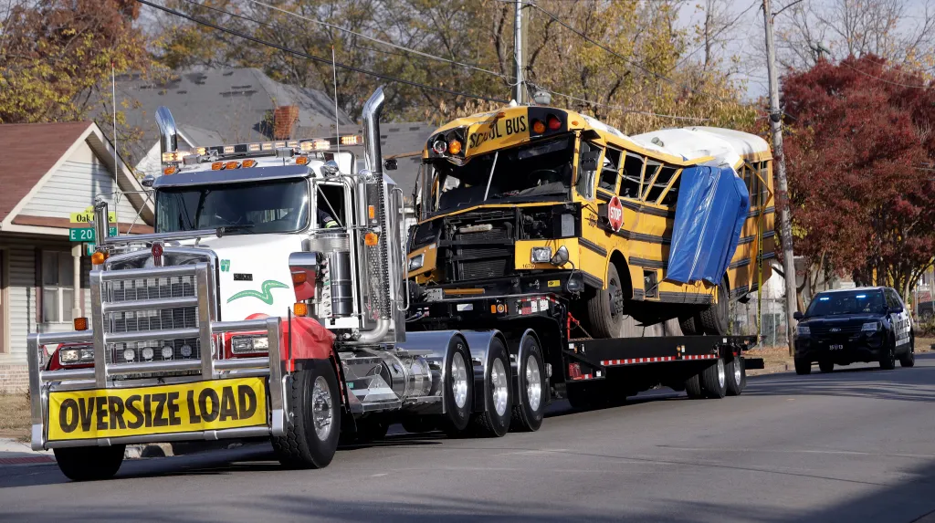 A school bus is transported away after a deadly bus crash in Chattanooga, Tenn., on Nov. 22, 2016.
