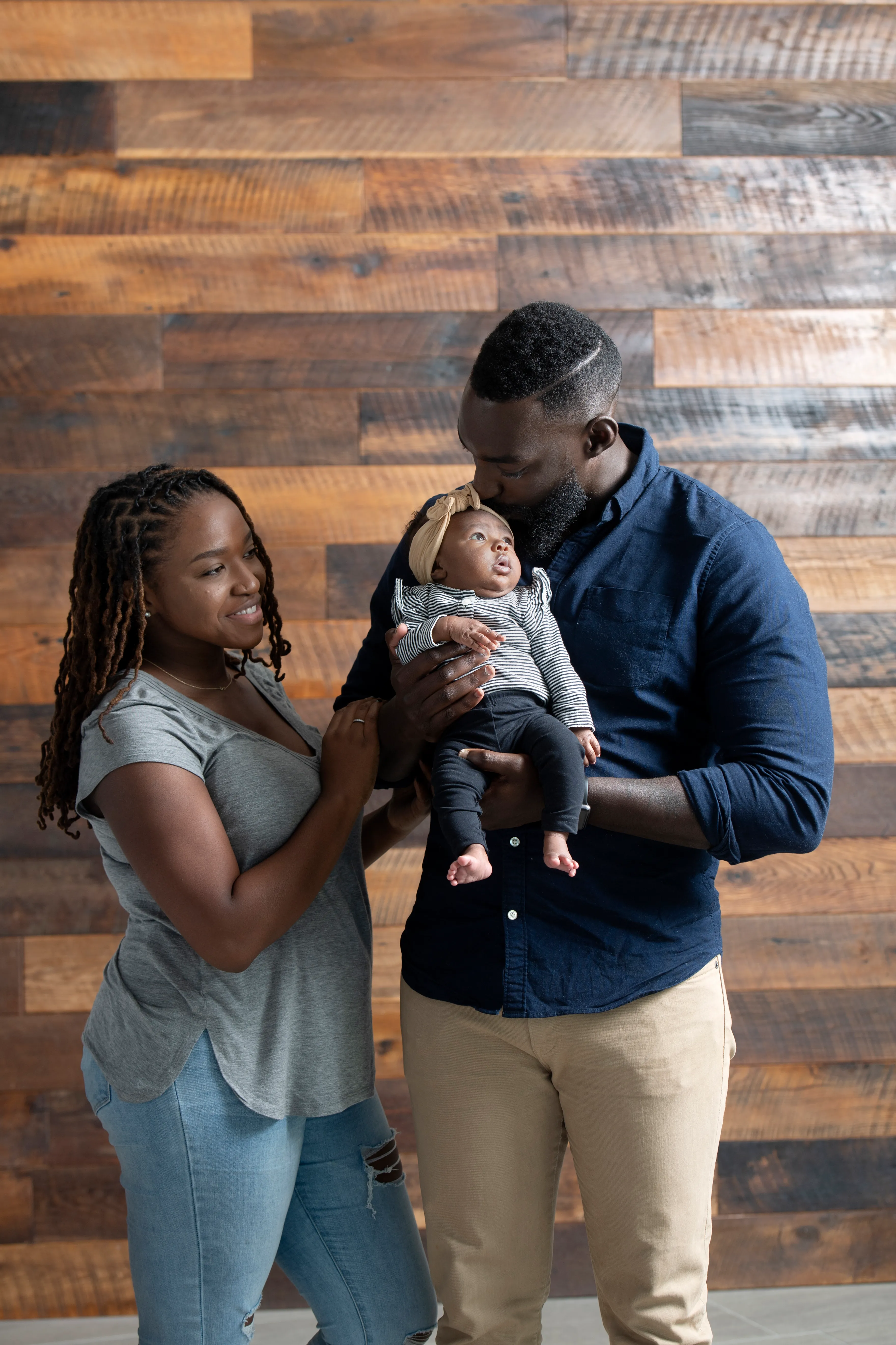 Eric Adjepong and his wife Janell with their infant daughter Lennox.