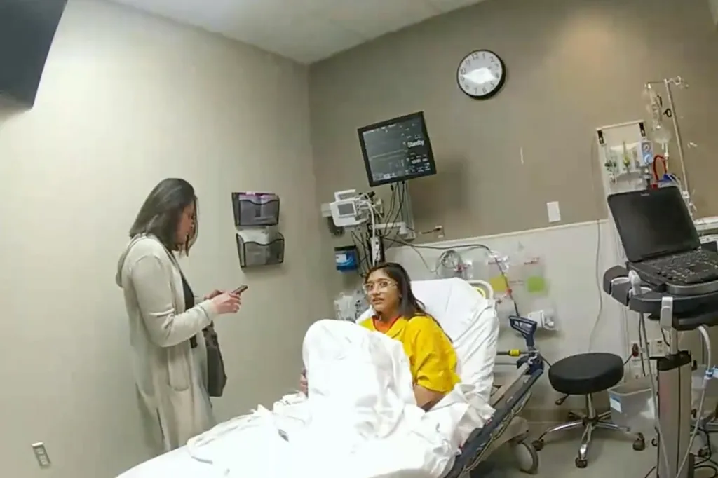 Alexee Trevizo, 19, in a hospital bed with her mother by her side.