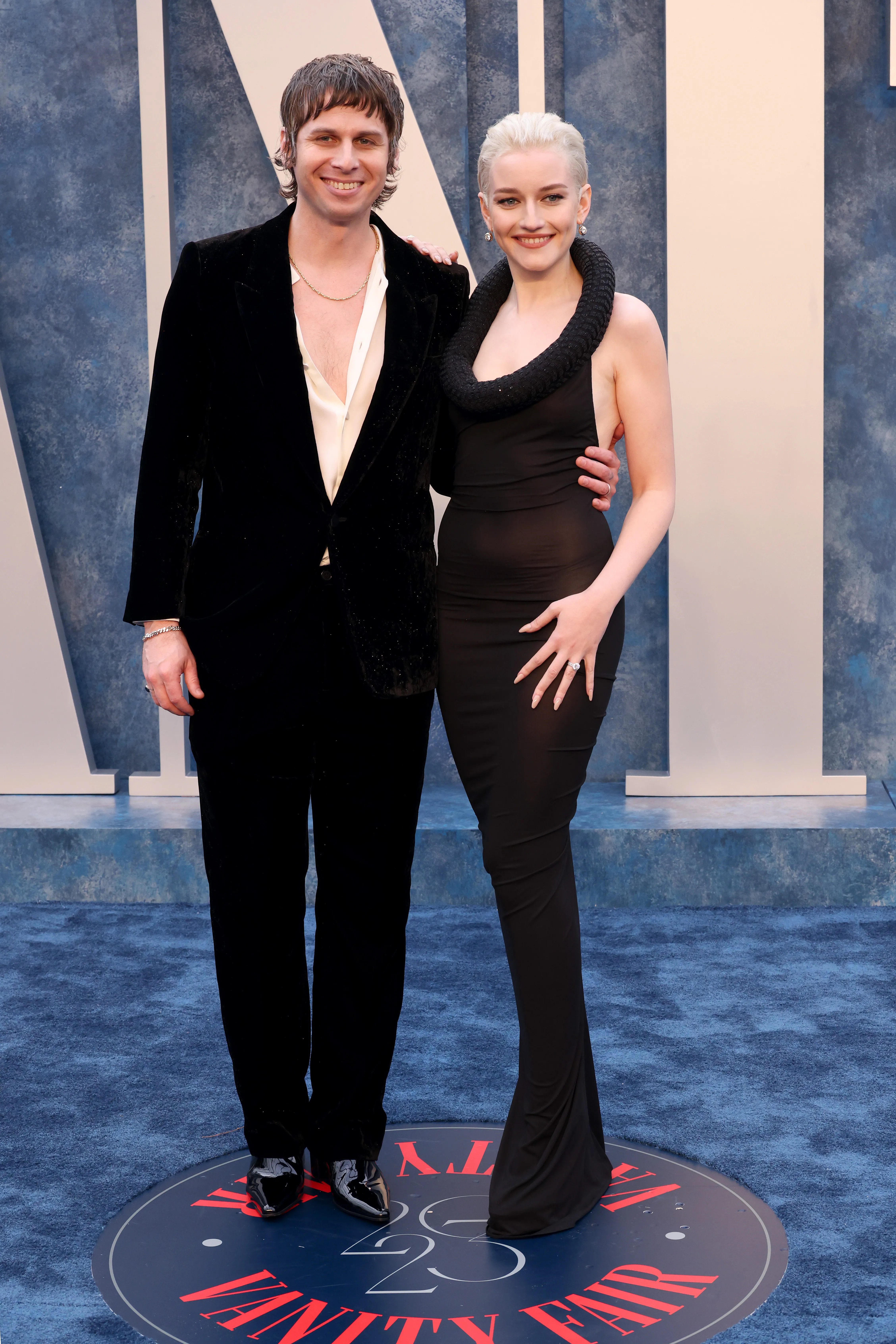 Mark Foster and Julia Garner attend the 2023 Vanity Fair Oscar Party.