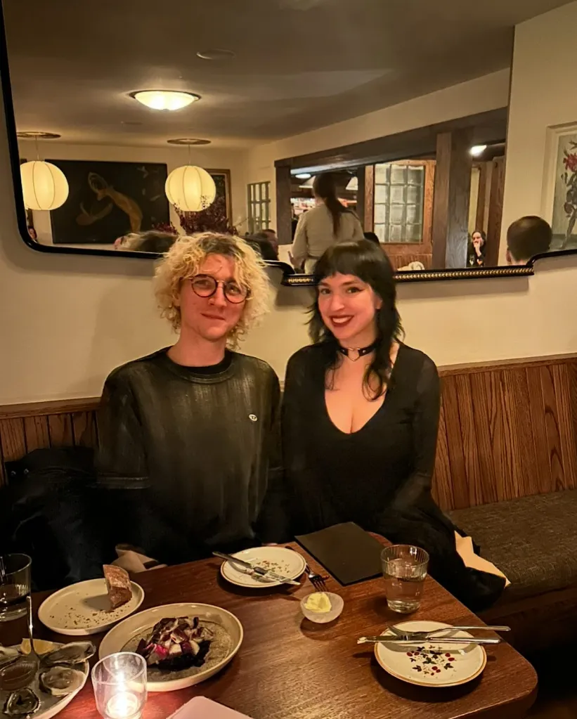 Sam Beard (left) and Jamie Peck, spokespeople for the December 4 Legal Committee, at a restaurant table.