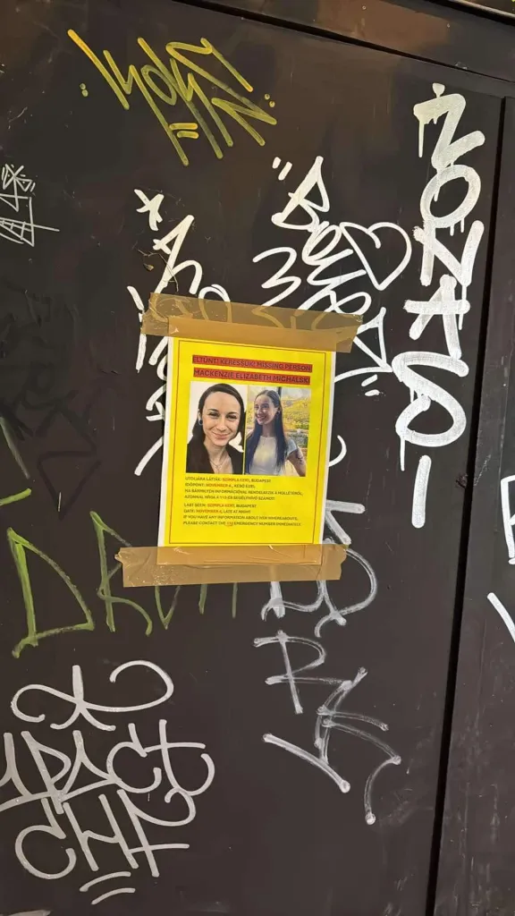 A missing persons poster taped to a door after Mackenzie Michalski's disappearance in Hungary.