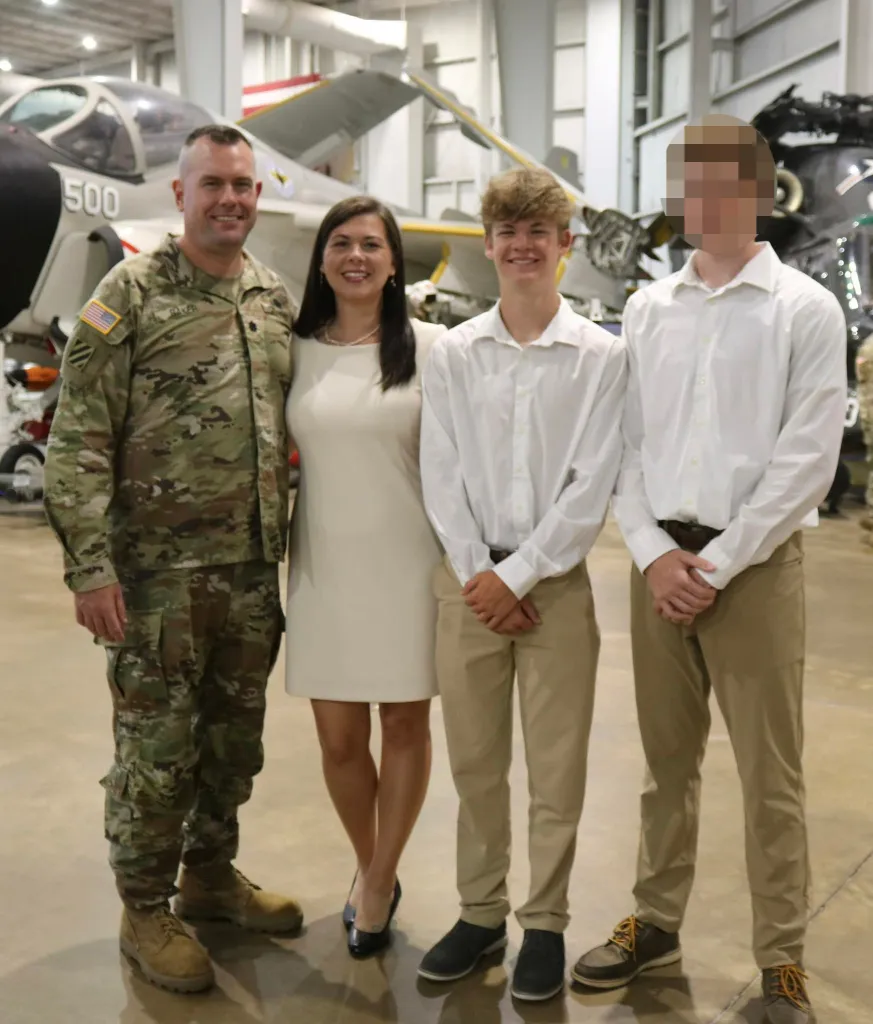 Lance Baker, Samantha Baker, Brandon Baker, and Wyatt Baker pose for a photo.