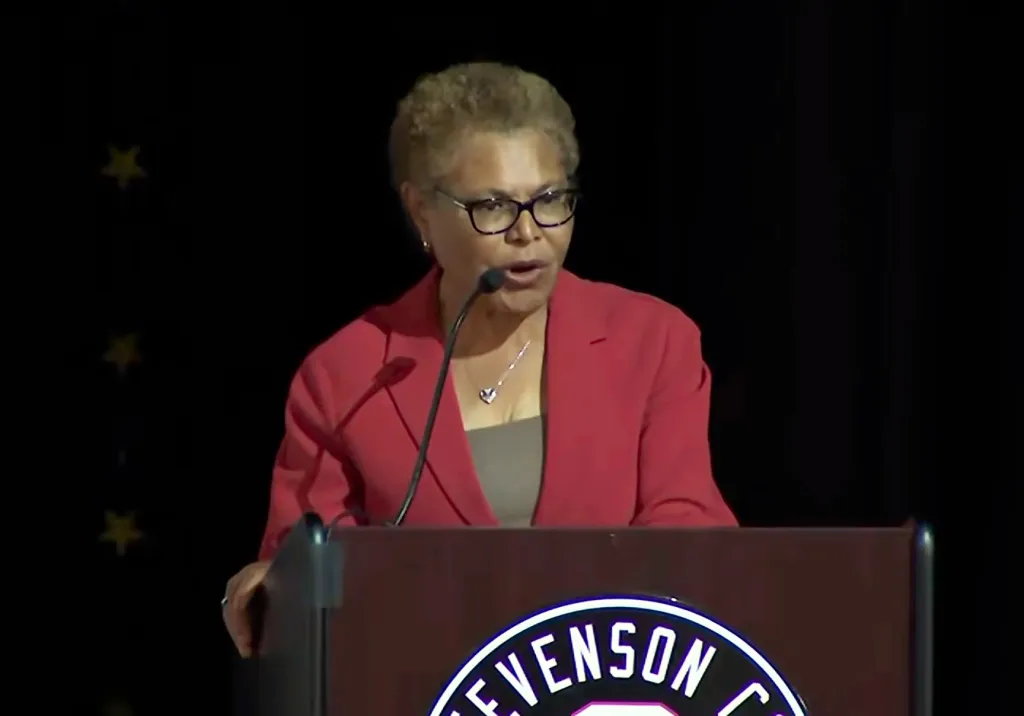 Los Angeles Mayor Karen Bass speaking at a podium.
