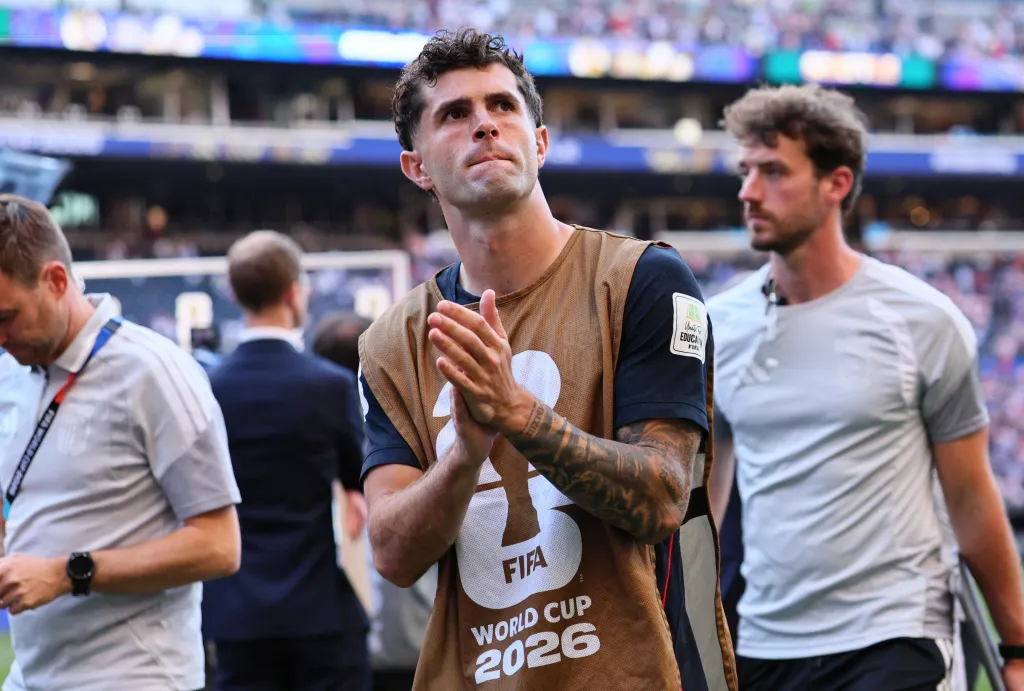 Christian Pulisic of the U.S. looks dejected as he applauds fans after the World Cup elimination match.