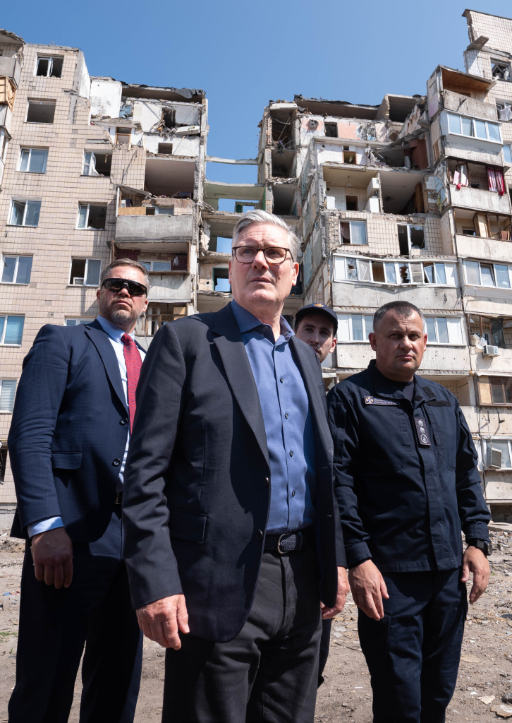 Britain's Prime Minister Sir Keir Starmer meets emergency workers in the Podilskyi area of Kyiv which was hit by multiple Russian missile strikes on July 6th where 8 people were killed on July 16, 2026 in Kyiv, Ukraine.