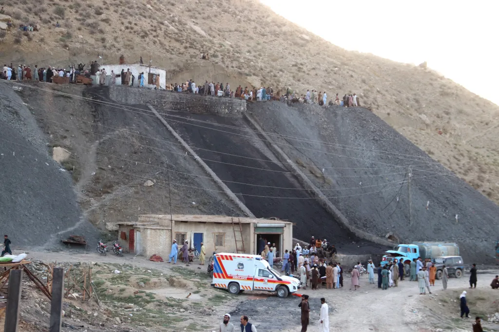 Rescue workers and locals gather at a coal mine after a blast in Pakistan.