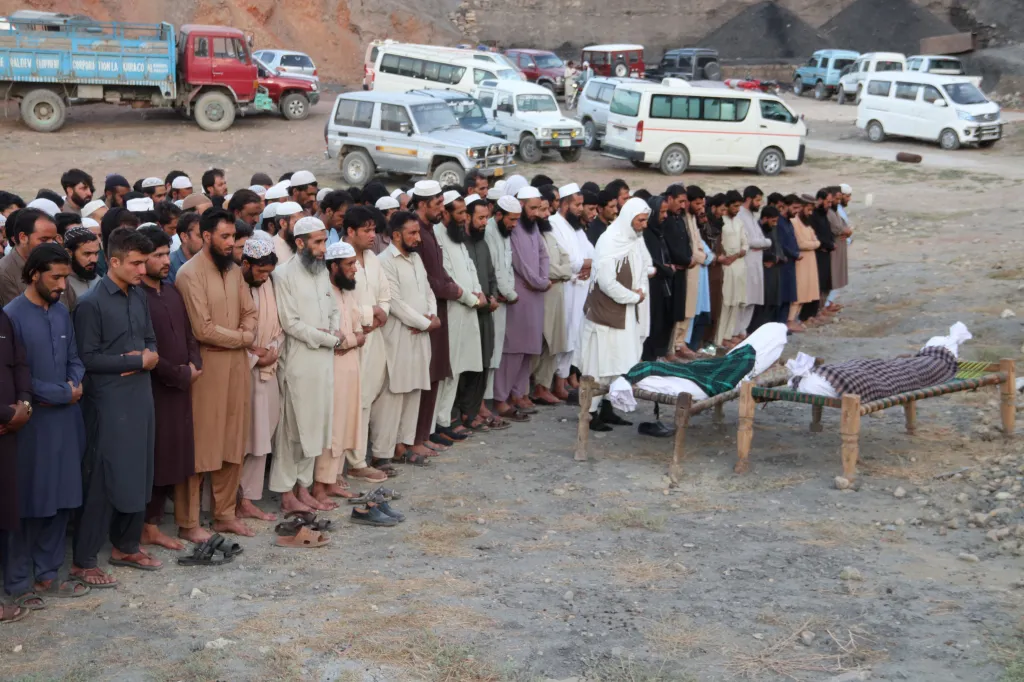 Mourners attending a funeral after a coal mine blast in Quetta, Pakistan.
