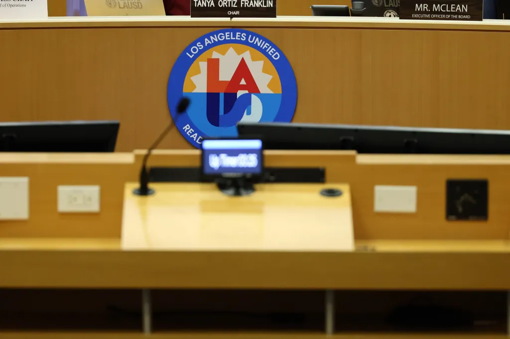 The Los Angeles Unified School District (LAUSD) logo at a school board meeting.