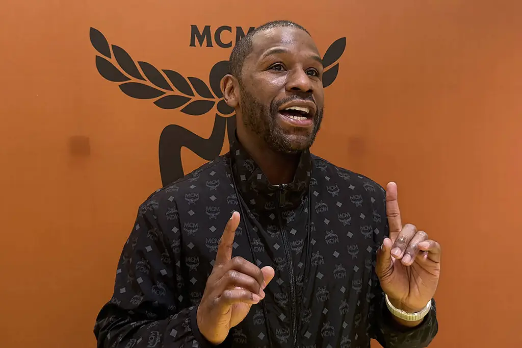 Floyd Mayweather speaking at the MCM retail store.