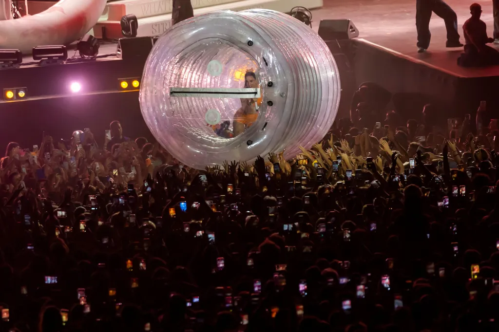 Katy Perry performing in a giant hamster ball during a concert at Paleo Festival.