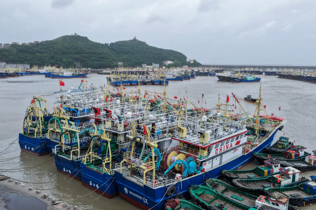 Fishing boats are docked at a port in Shitang Town of Wenling City as the area braces for Typhoon Bavi.