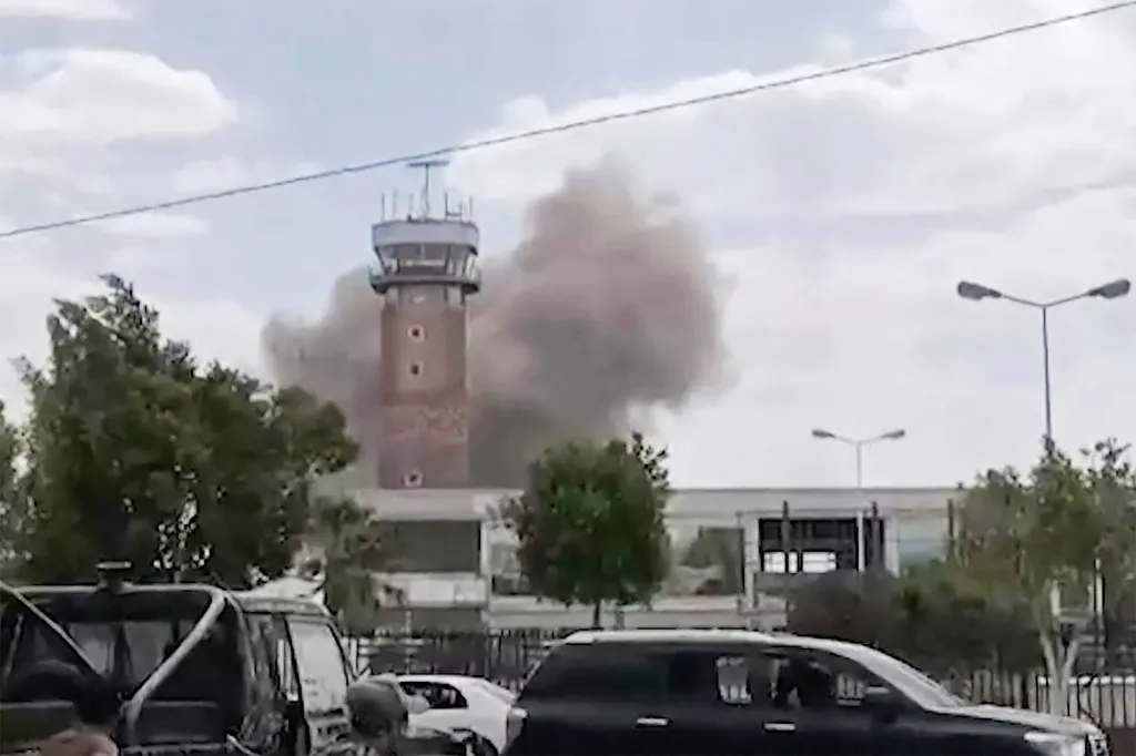 Smoke rising from a tower at Sanaa airport.