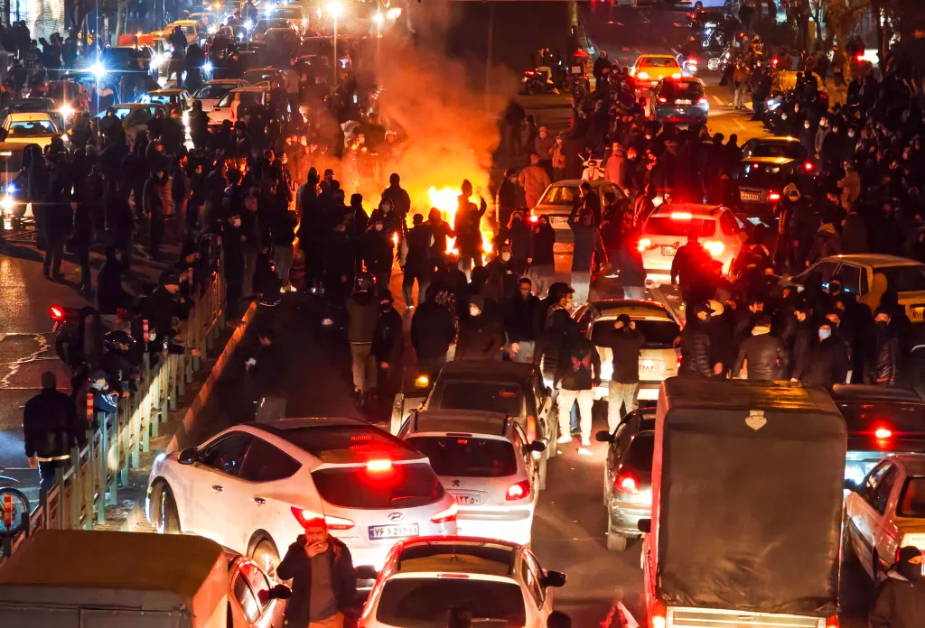 A fire in the middle of a road in Tehran, Iran during a protest on Jan. 8, 2026.