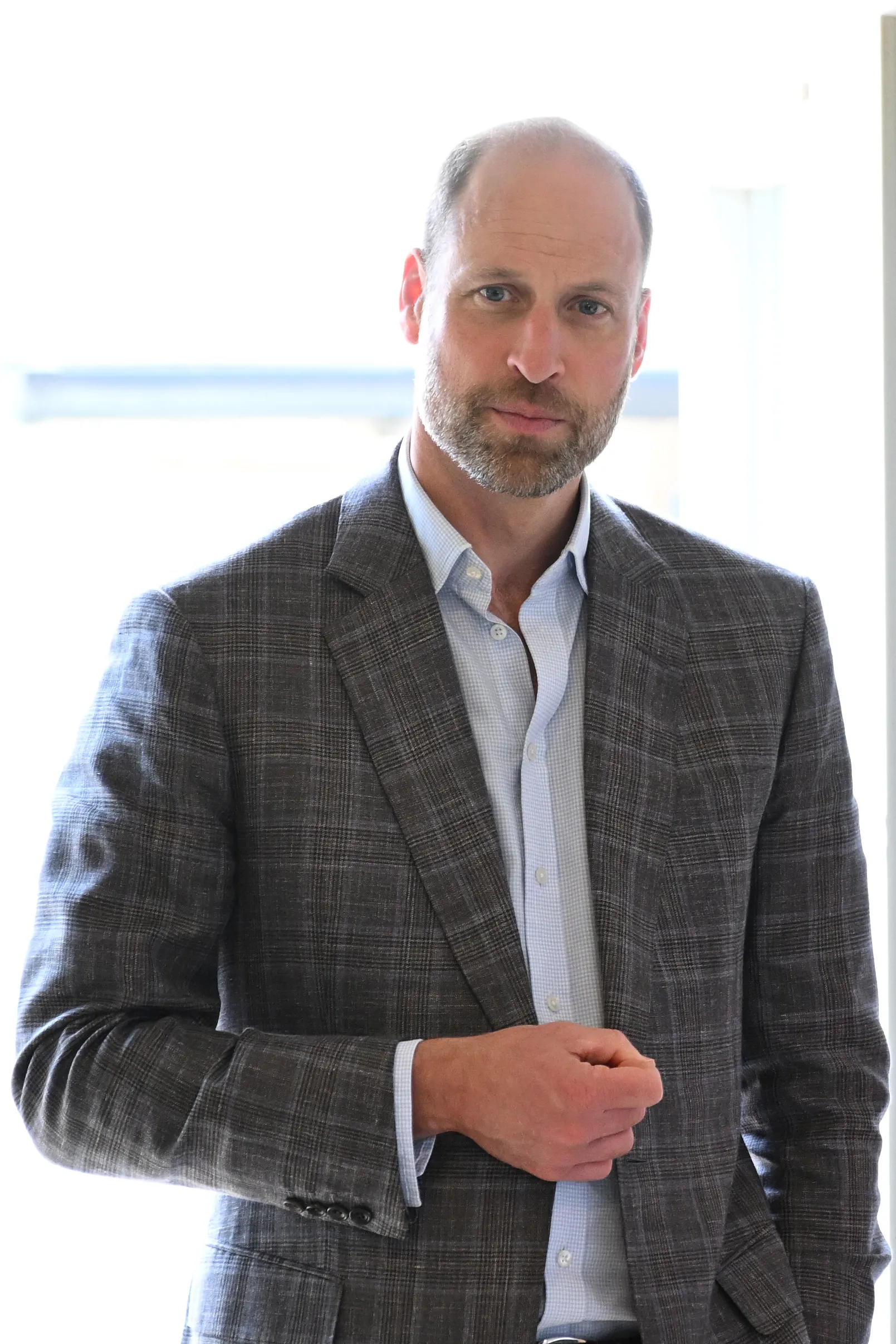 Prince William, Prince of Wales, poses for a vertical full shot at The Apricot Centre.