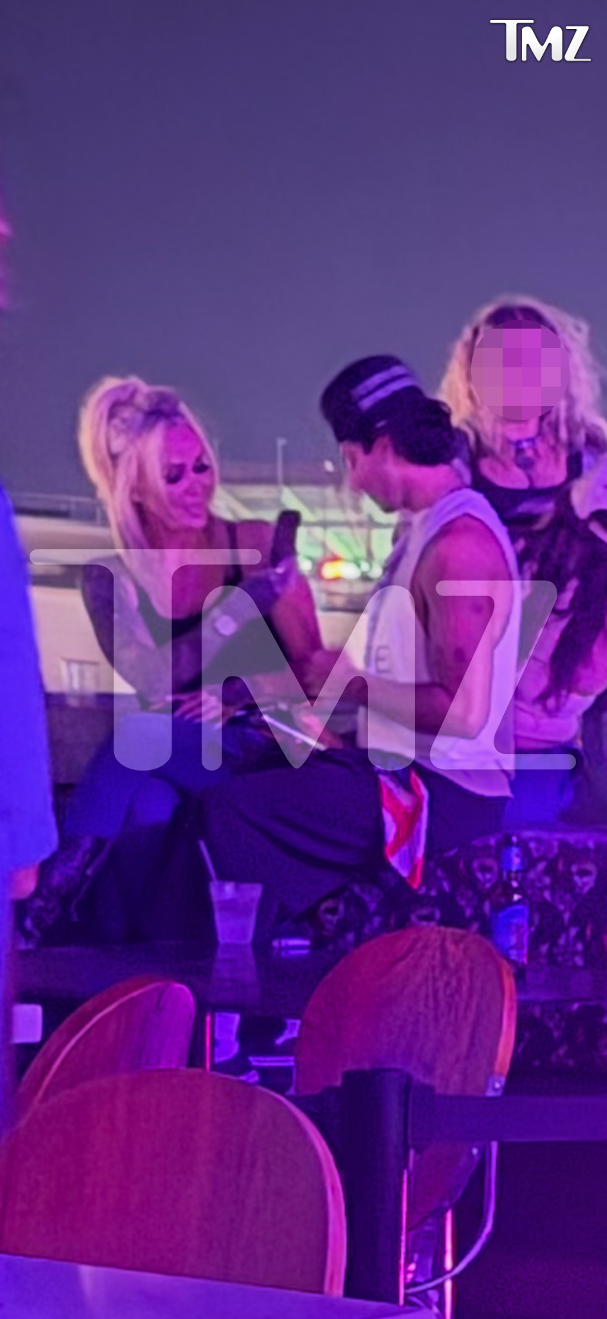 Bunnie Xo and Dylan Wolf hanging out at a bar.