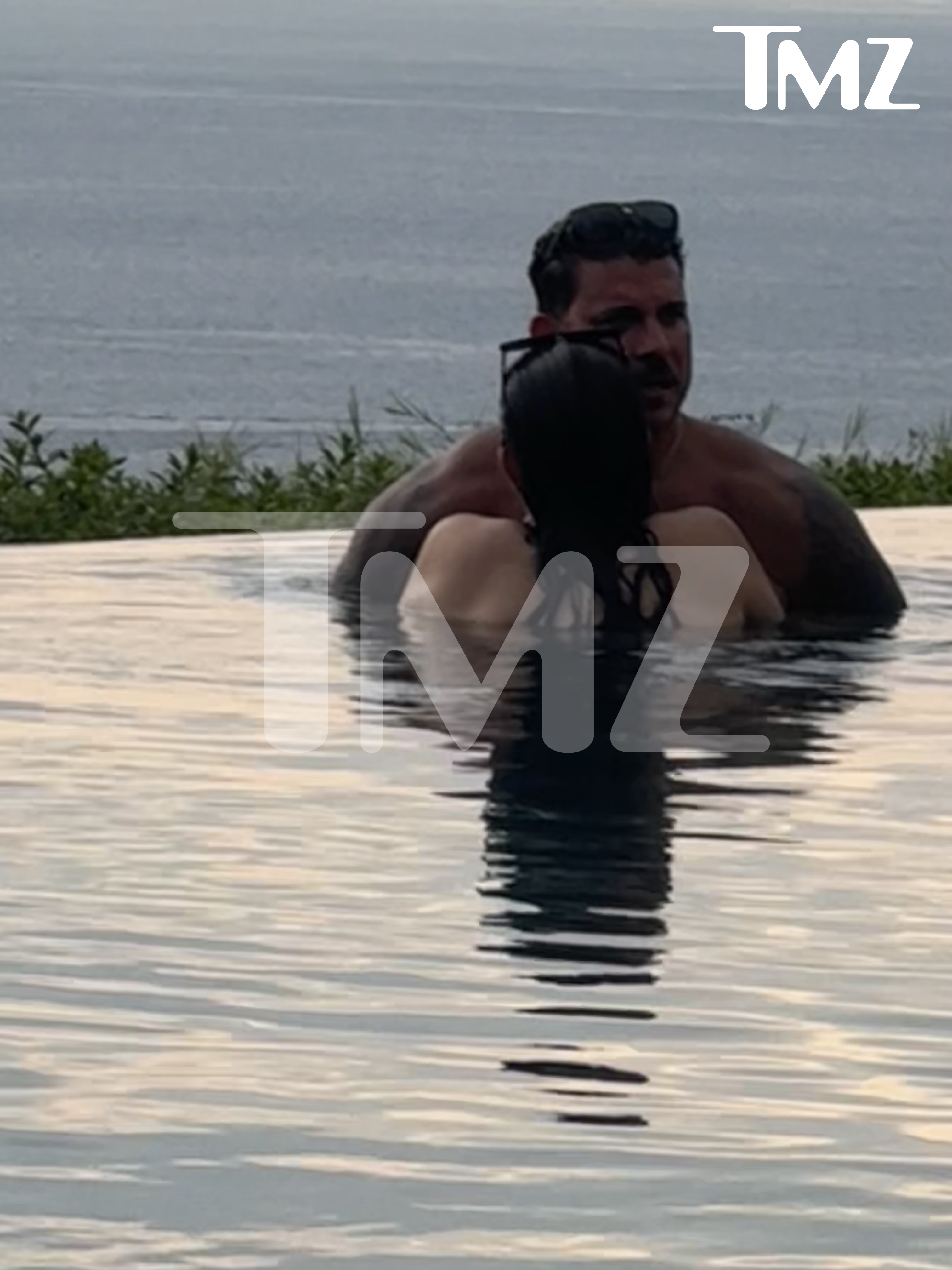 Jax Taylor and Lori Krebs in a pool.
