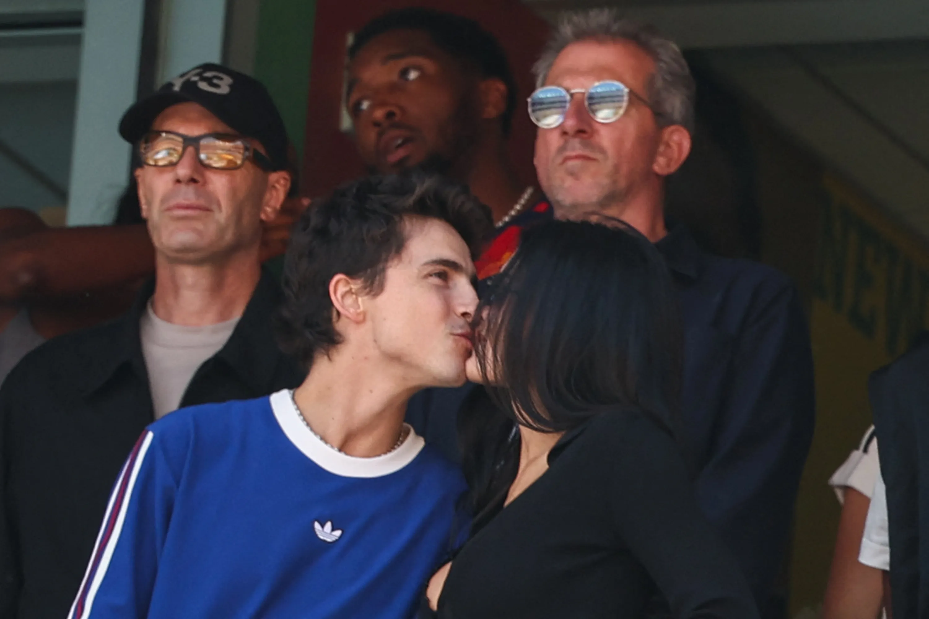 Timothée Chalamet and Kylie Jenner kissing at the 2026 World Cup final.