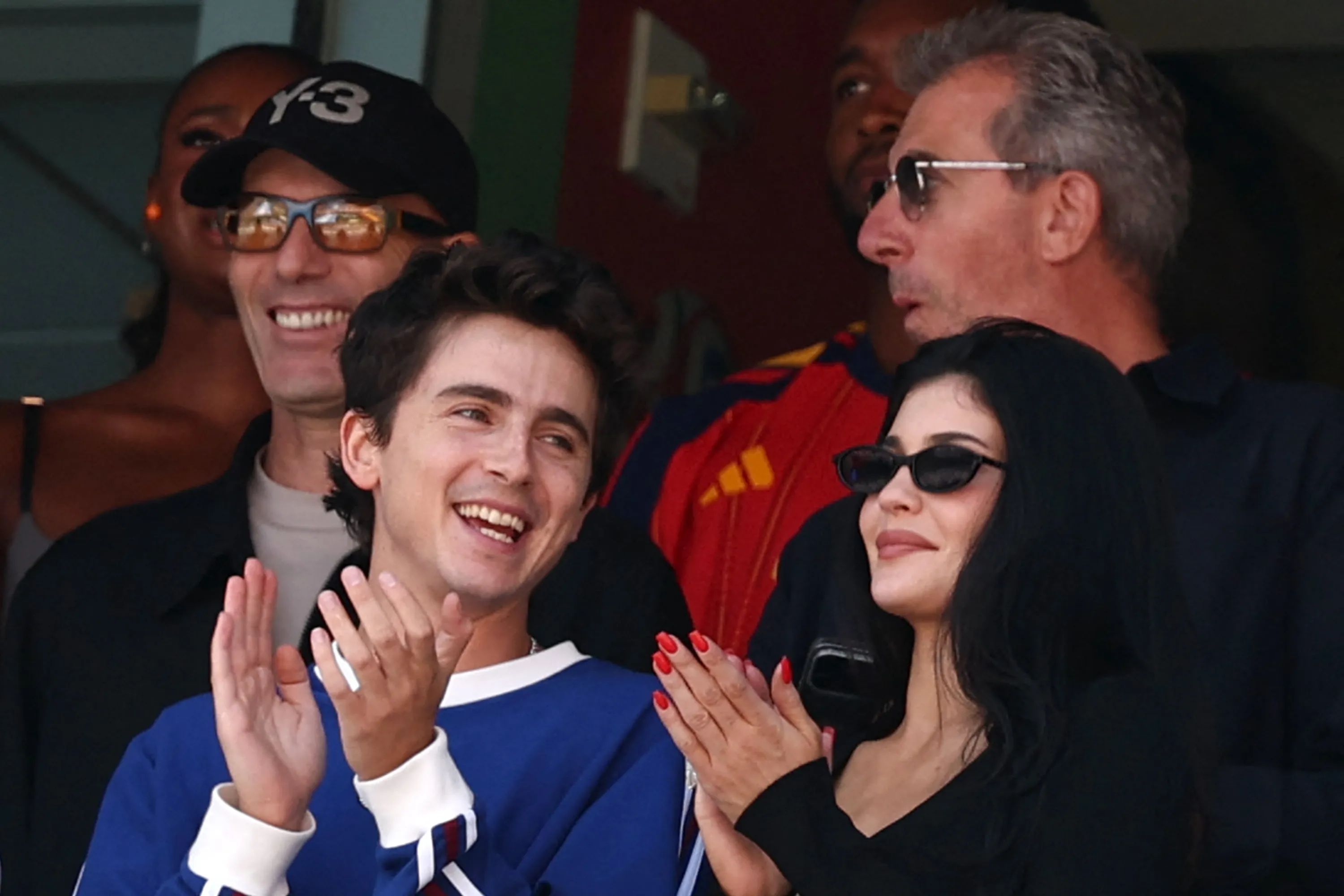 Timothee Chalamet and Kylie Jenner applauding at the World Cup final.