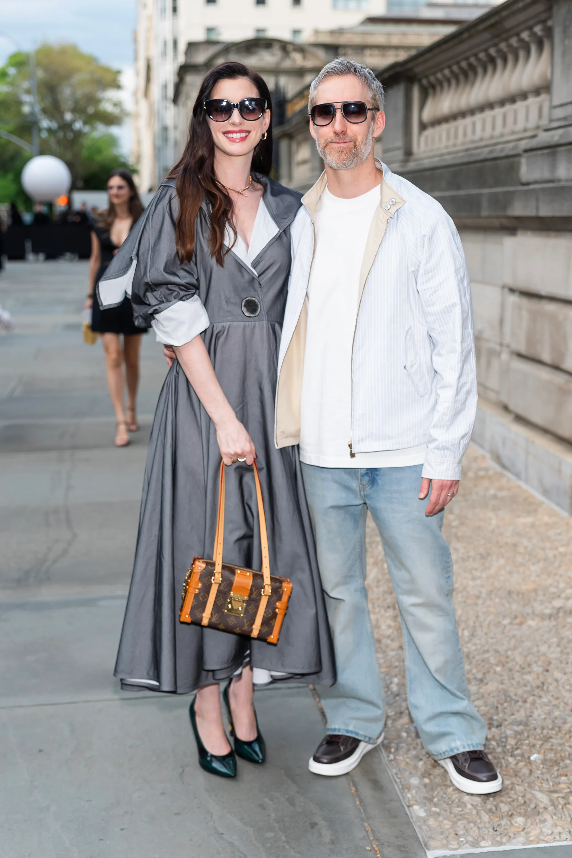 Anne Hathaway and Adam Shulman attend Louis Vuitton Cruise 2027.