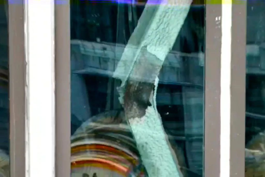 Screen grab of structural damage to a building column.