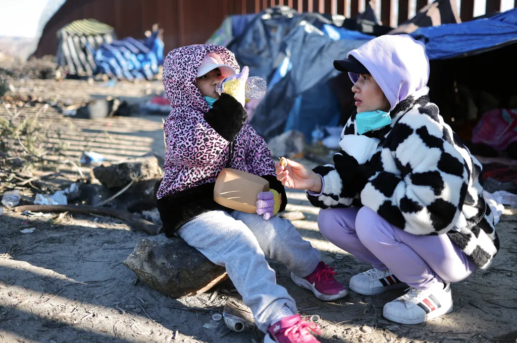 Mother and daughter at a makeshift camp in Jacumba Hot Springs, California.