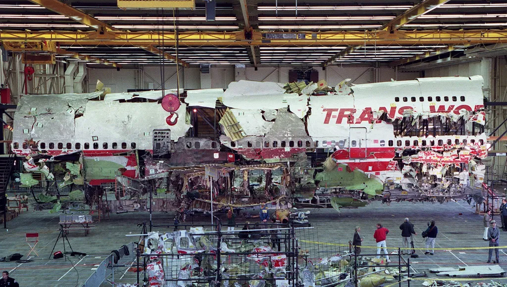 Wreckage of the TWA Flight 800 Boeing 747 aircraft displayed in its reconstructed state.