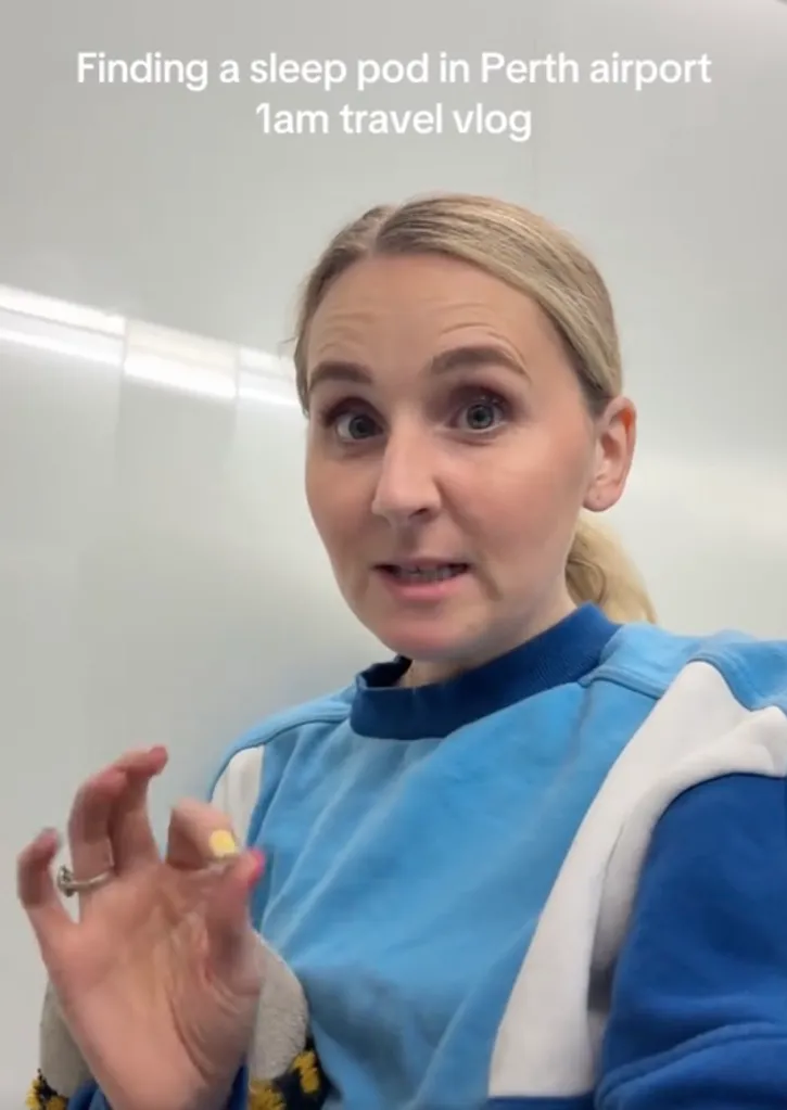 A woman making a vlog about finding a sleep pod at Perth airport.