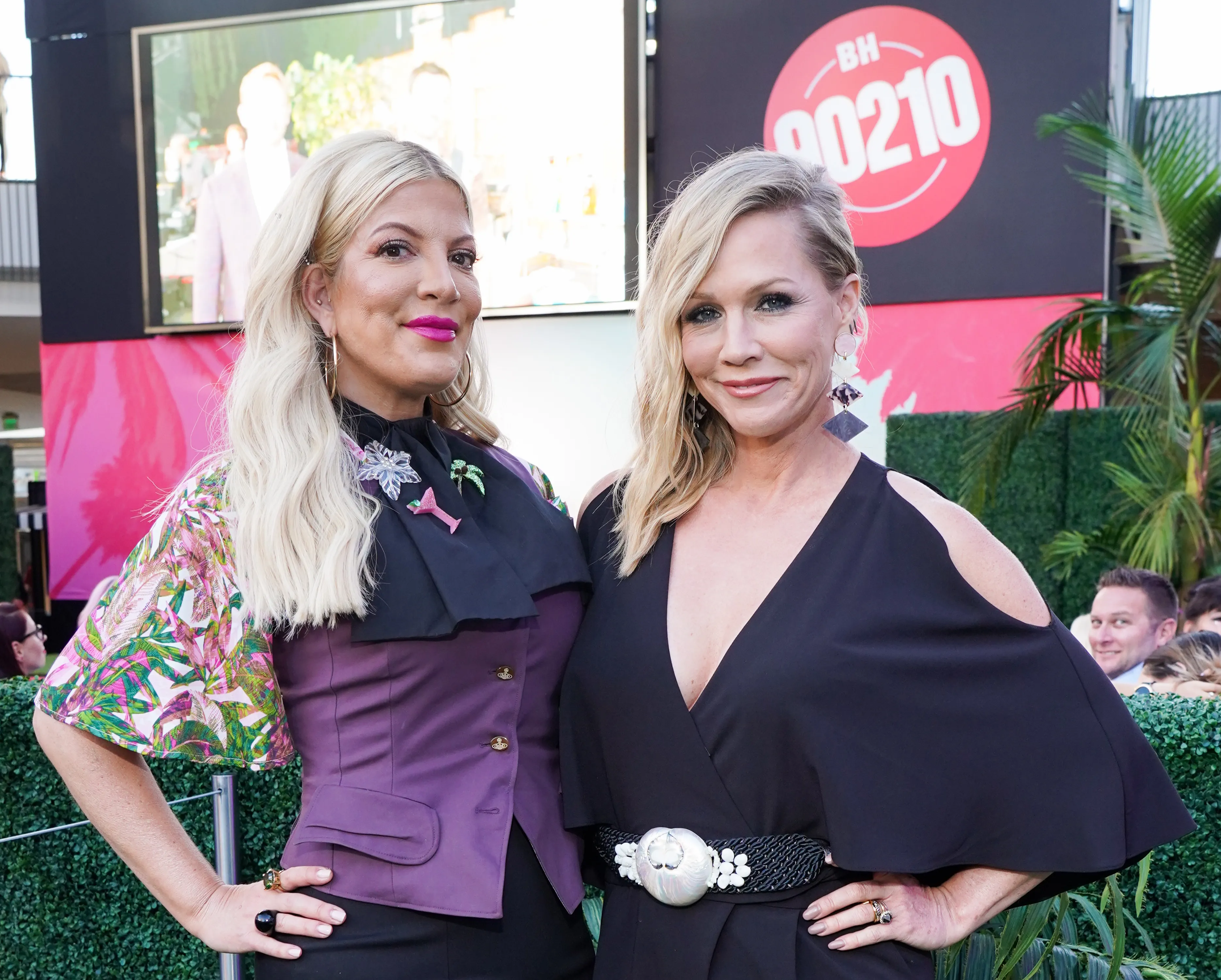 Tori Spelling and Jennie Garth at the Beverly Hills 90210 Costume Exhibit Event.