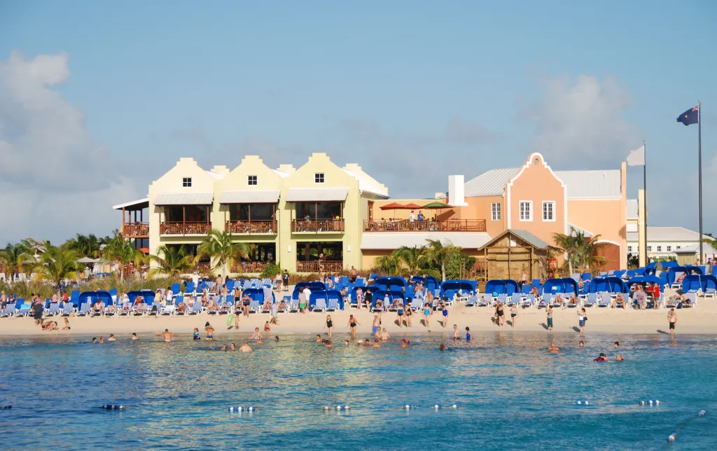 Beachgoers enjoy the Caribbean waters of Grand Turk, Turks and Caicos.