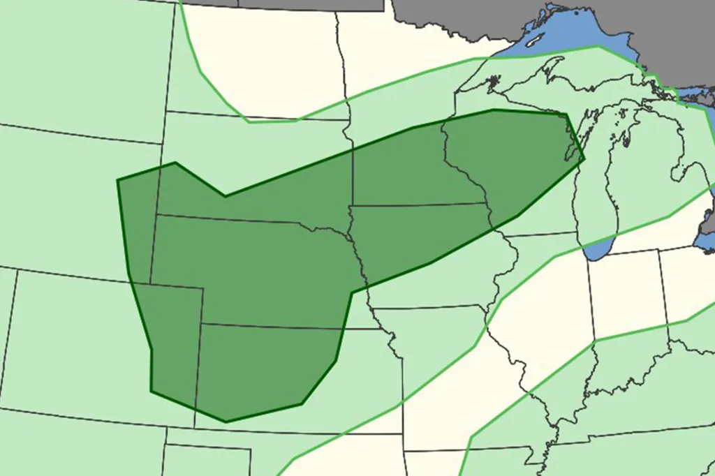 Weather map showing a large area of predicted rain or severe weather over the central United States, extending from the Dakotas and Nebraska eastward to Michigan and Wisconsin.