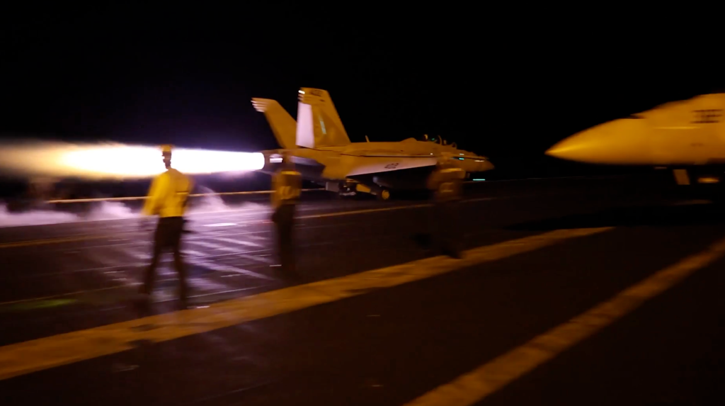 A fighter jet is launched off an aircraft carrier in the Middle East during the latest round of American strikes on Iran on July 18, 2026.
