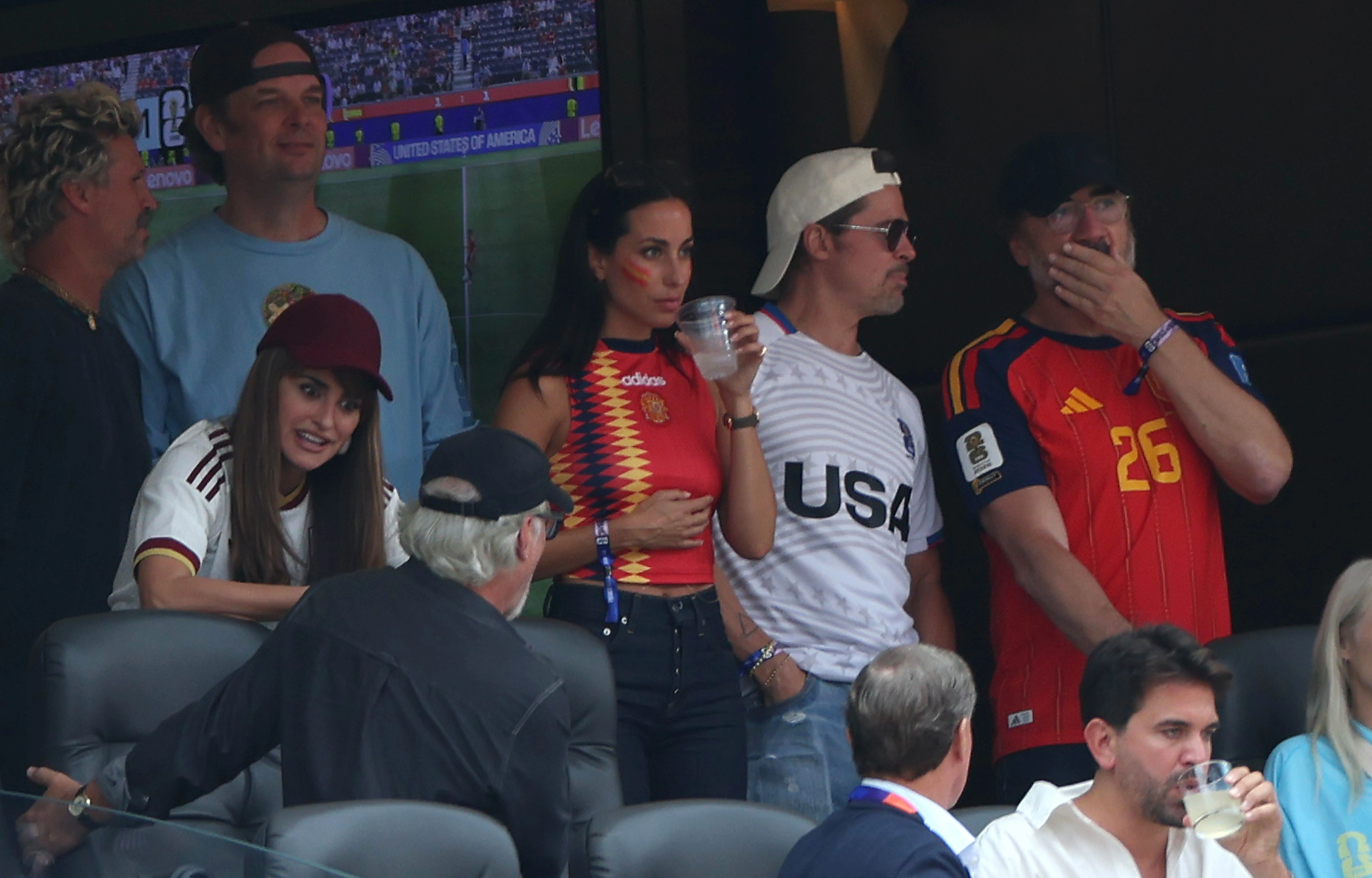 Brad Pitt and Ines de Ramon, with Penelope Cruz and Javier Bardem, watching the Spain v Belgium FIFA World Cup match.