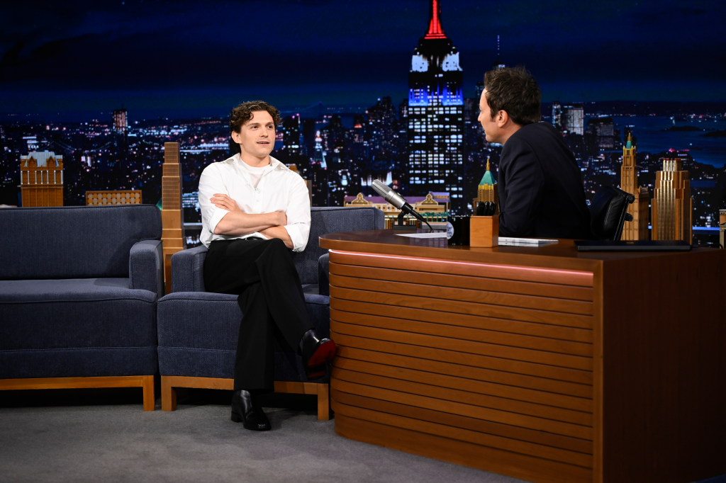 Actor Tom Holland being interviewed by host Jimmy Fallon on "The Tonight Show."