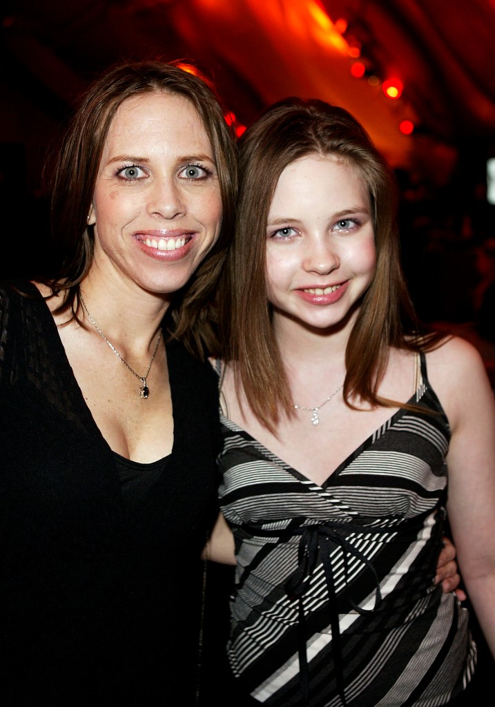 Daveigh Chase and her mother Cathy Chase smiling at an event.