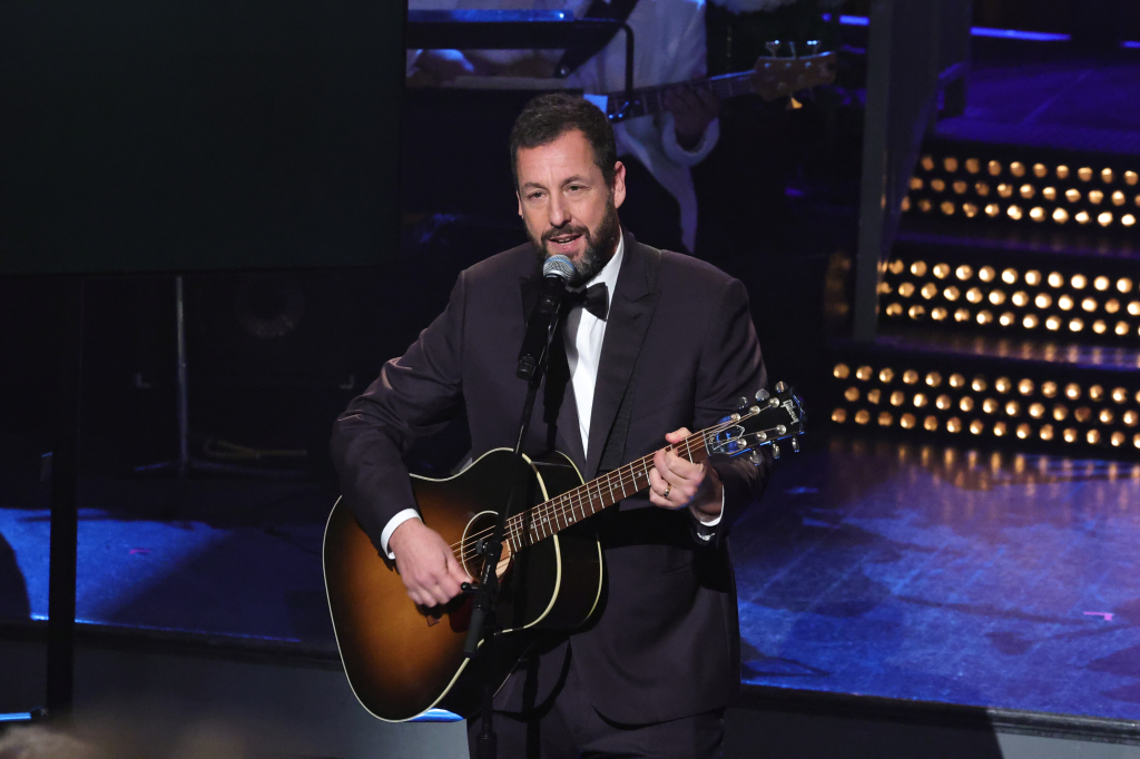 Adam Sandler performing