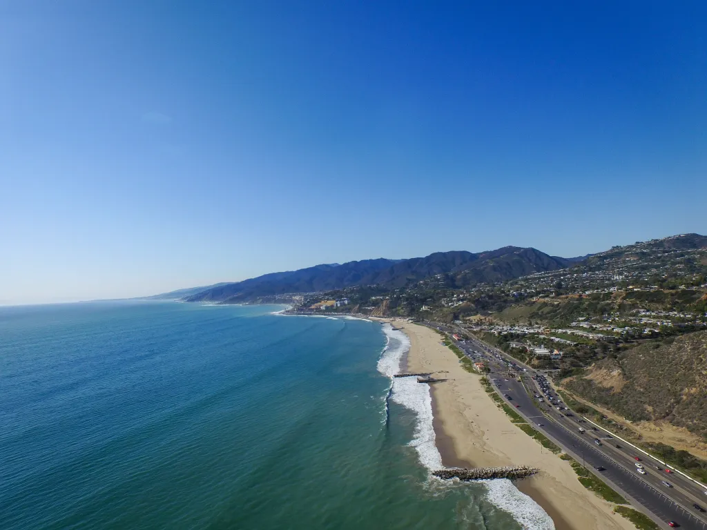 Police chase at Will Rogers State Beach.