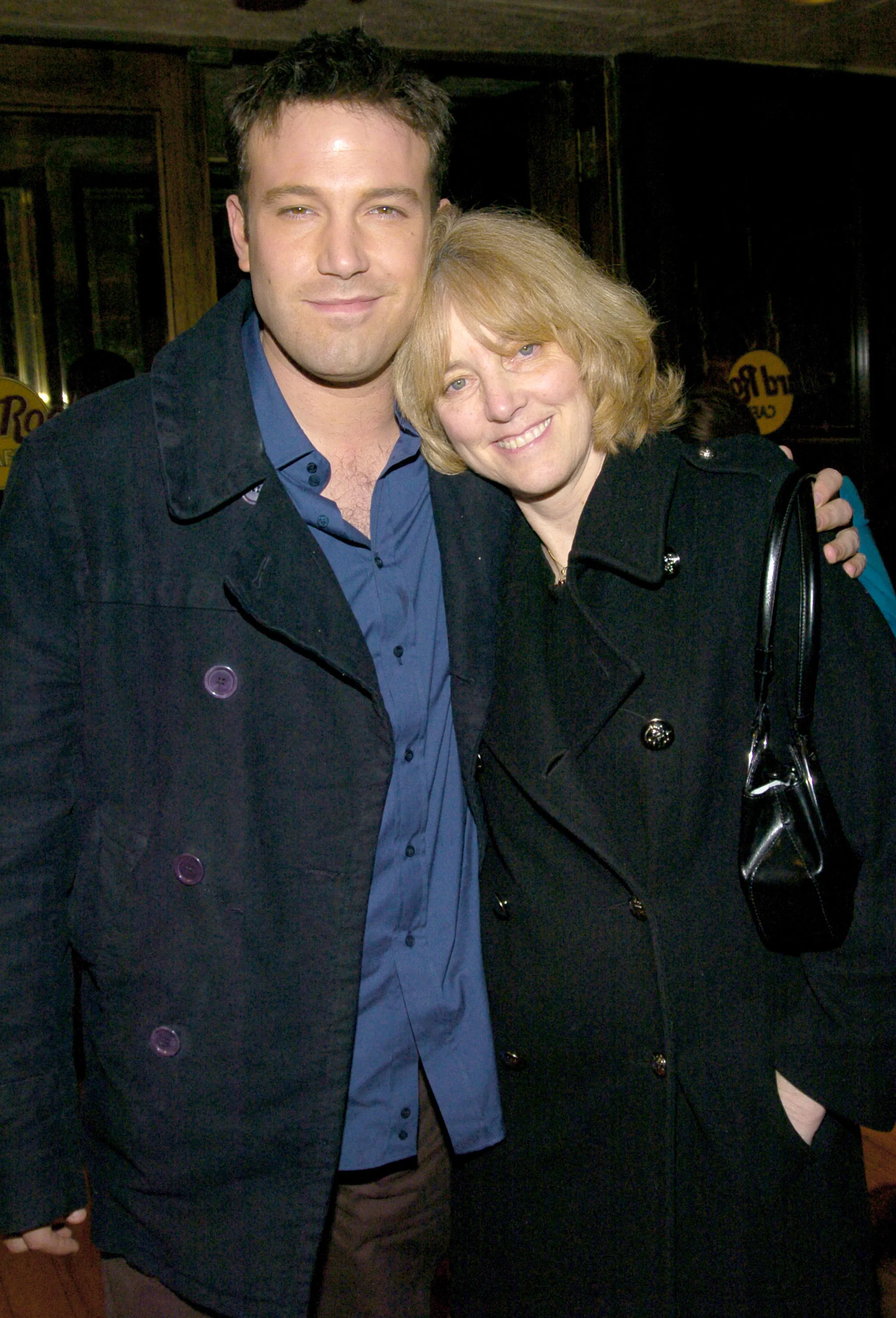 Ben Affleck and his mother Chris posing together at the Hard Rock Cafe.