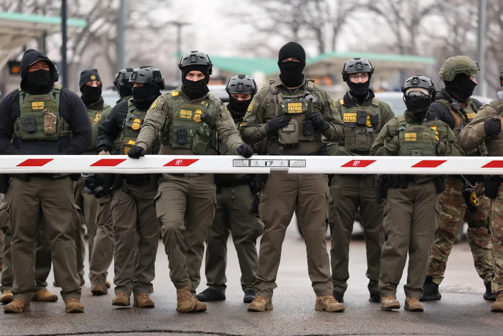 A photo of ICE agents in camo clothing in Minnesota.