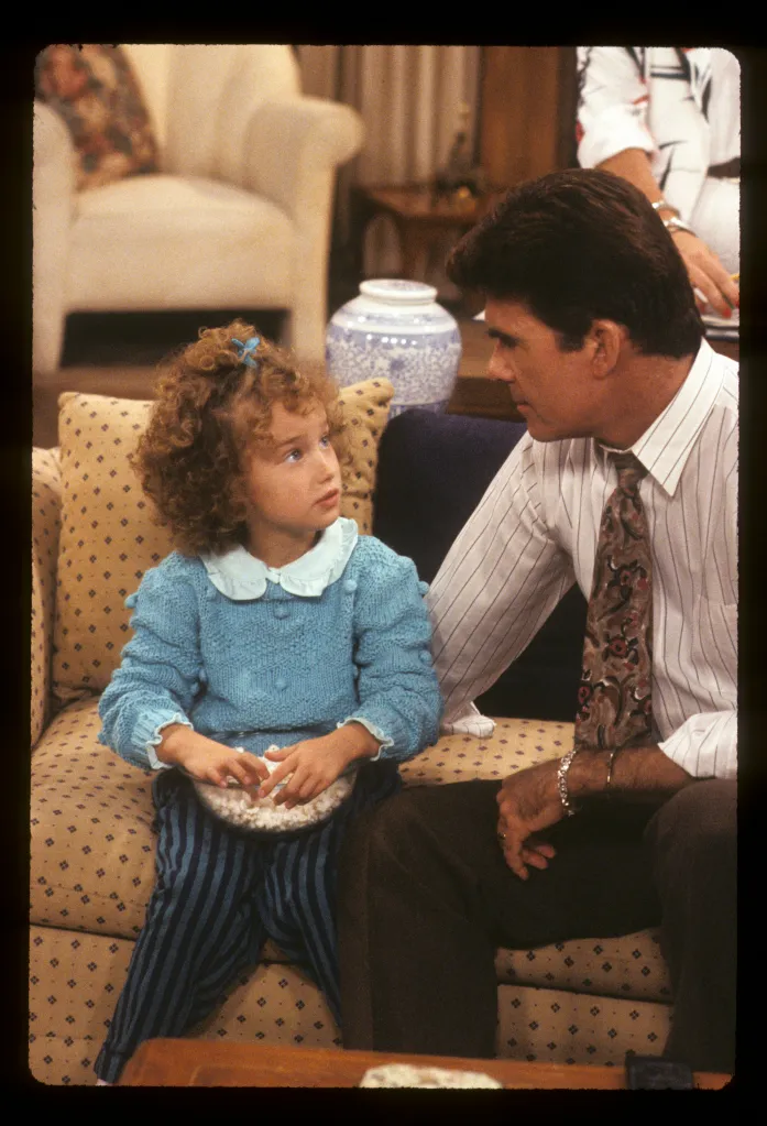 Ashley Johnson and Alan Thicke on the TV show "Growing Pains."