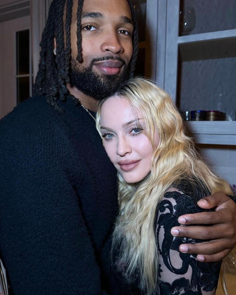 Madonna and Akeem Morris embracing.