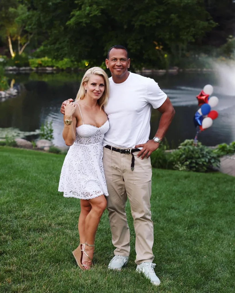 Alex Rodriguez and Jac Cordeiro standing together in a garden.