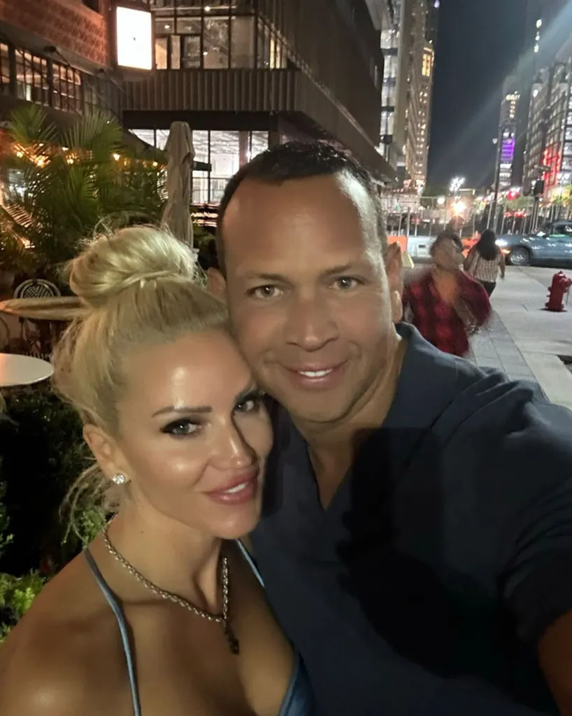 Alex Rodriguez and Jac Cordeiro smiling outdoors at night.
