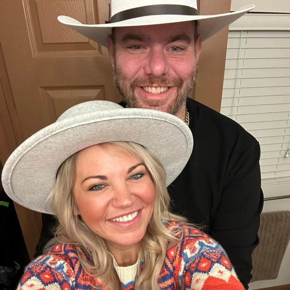 Alexandra Allie Hummel and Andrew Hummel smiling in hats.