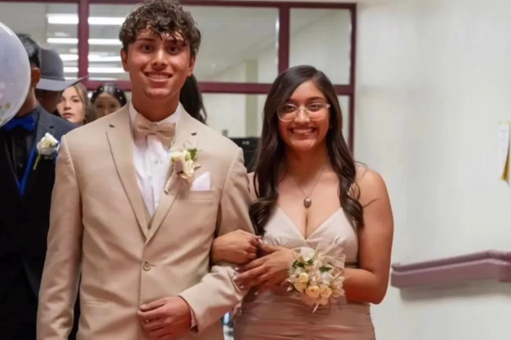 Alexee Trevizo, in a champagne-colored dress, holding her date's arm.