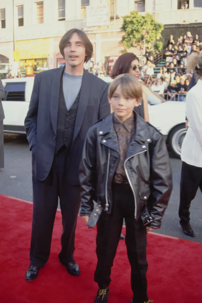 Jackson Browne and his son, Ethan Browne, on a red carpet.