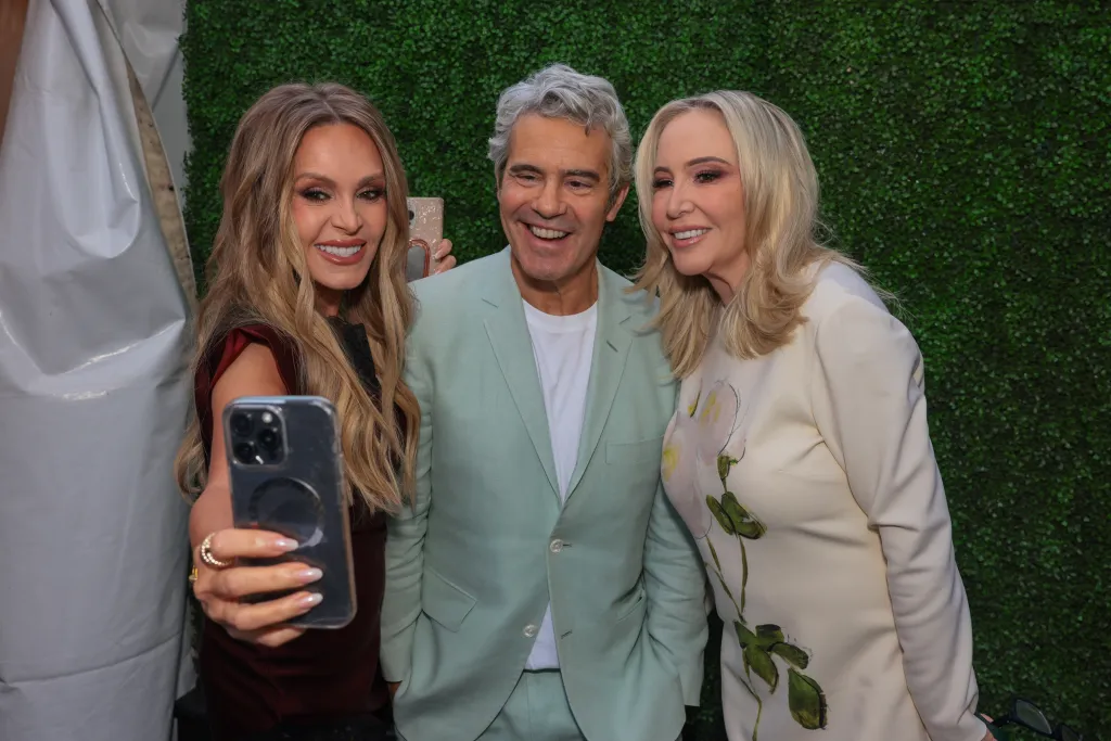Tamra Judge taking a selfie with Andy Cohen and Shannon Storms Beador.