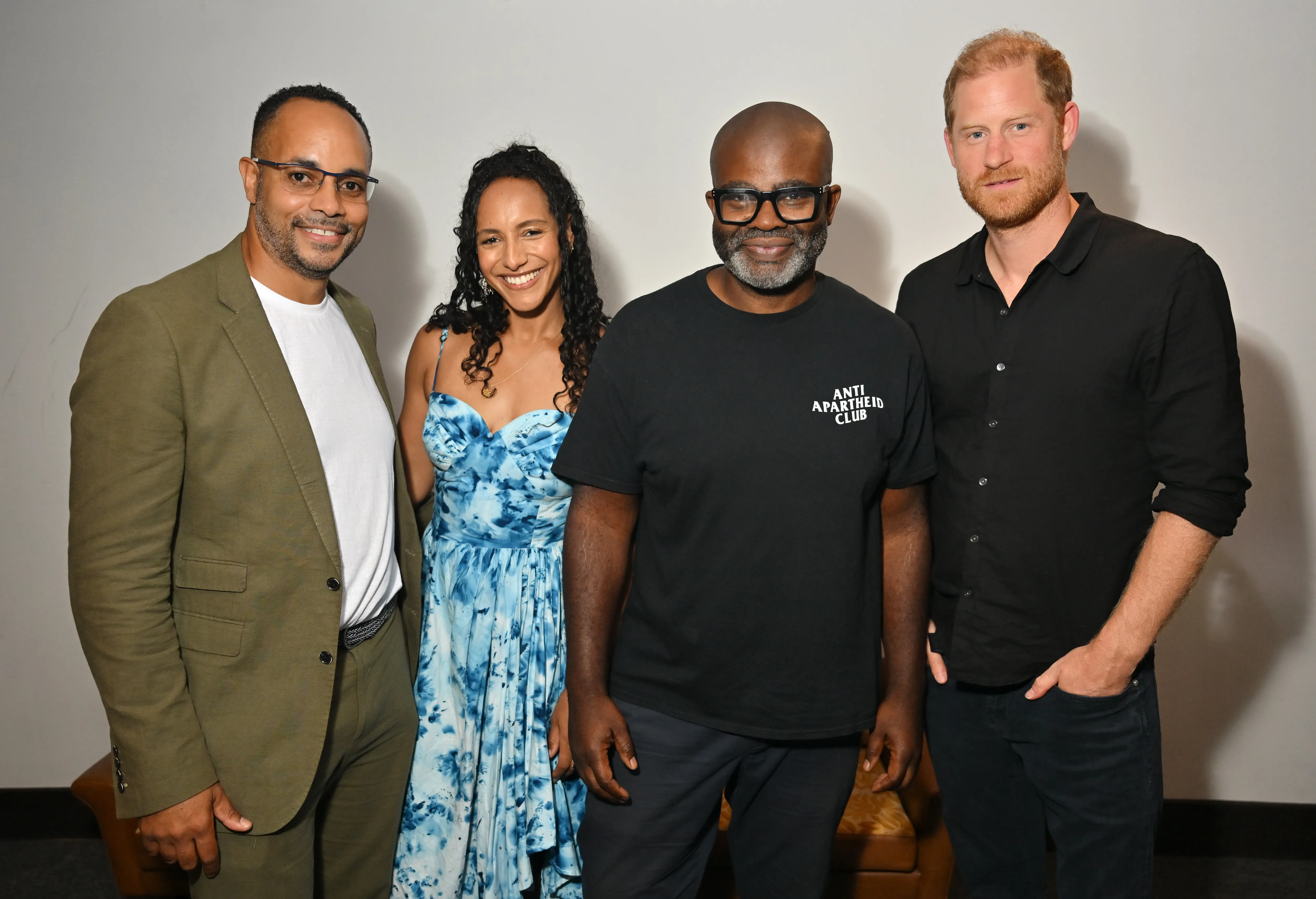 Andy Mundy-Castle, Afua Hirsch, Misan Harriman and Prince Harry, Duke of Sussex smiling together.