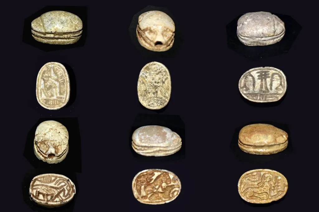 A collage of ancient Egyptian scarab artifacts, some showing their carved top and others showing their hieroglyphic bottoms.